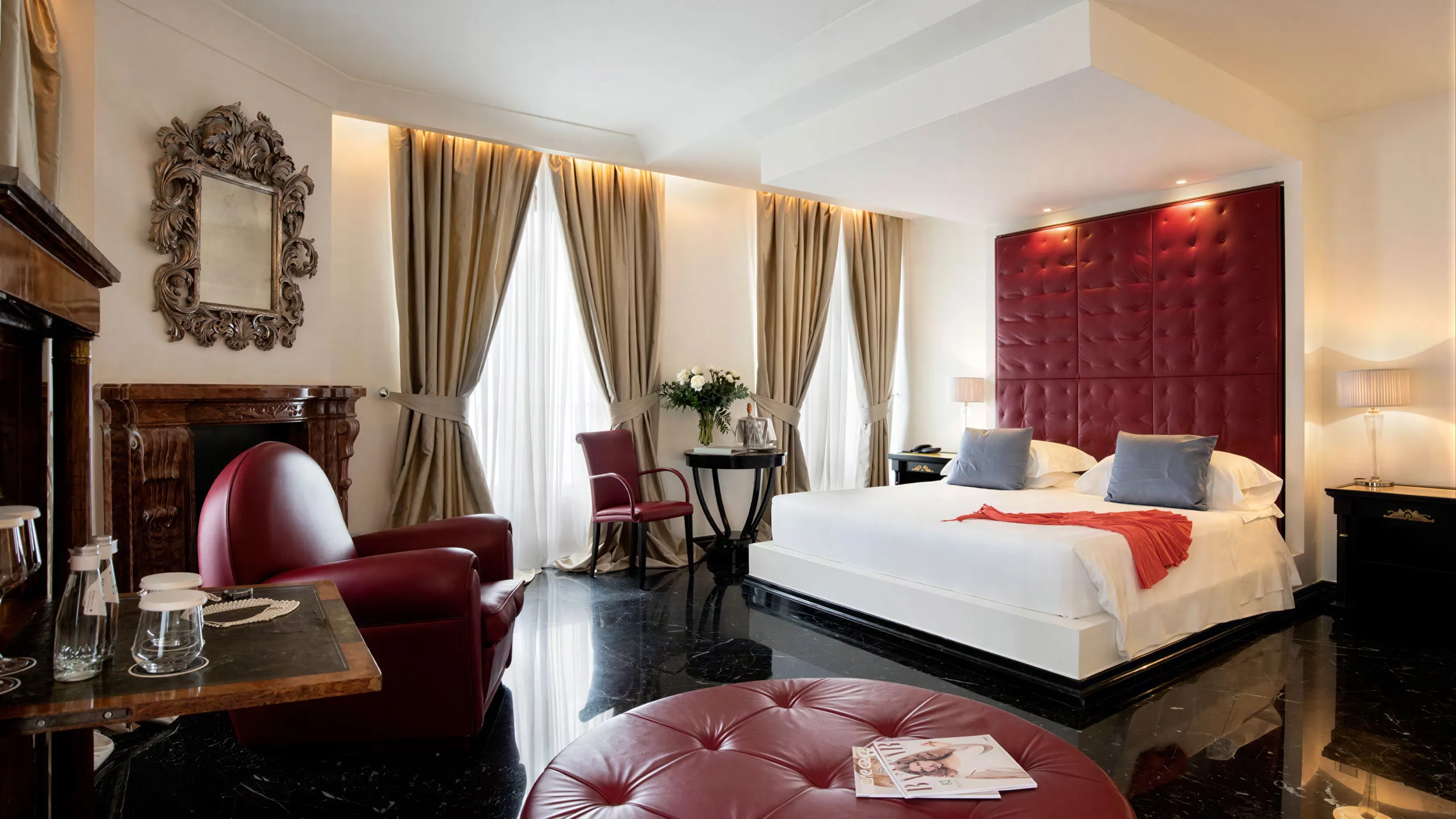 Metropole Suite sea view at Hotel Metropole Taormina with double bed and seating area