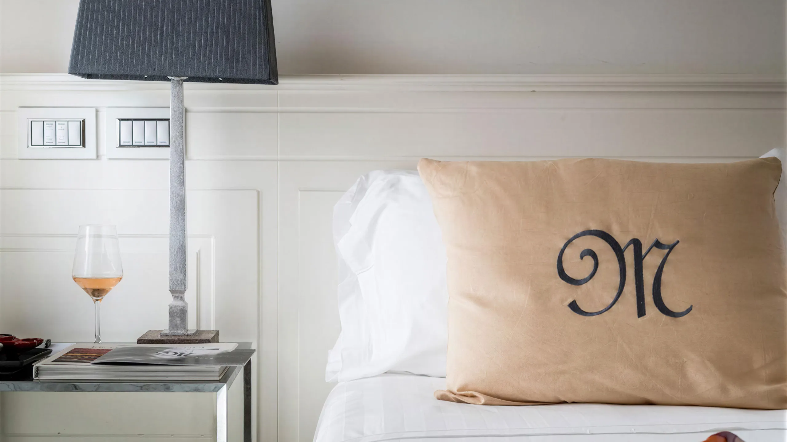 Detail of the Superior city view room at Hotel Metropole Taormina with bed and elegant furnishings